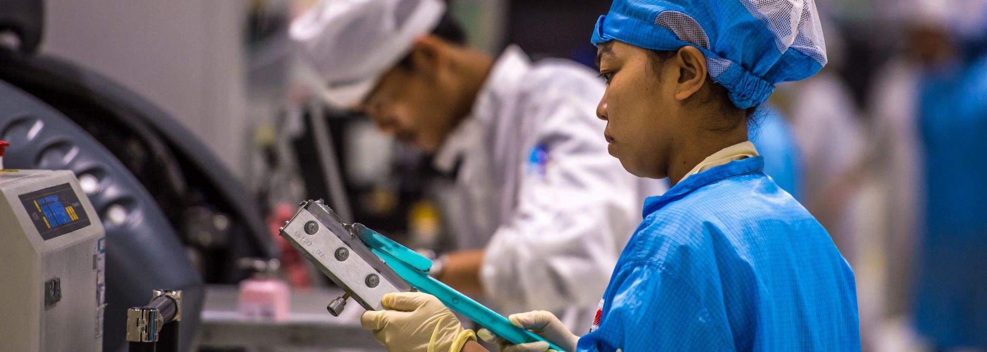 Workers at an electronics factory in Southeast Asia. Photo credit: ADB.